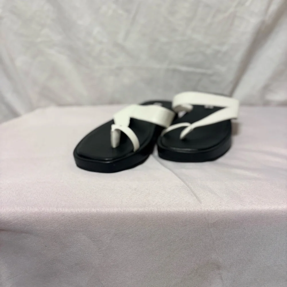Saks Fifth Avenue round toe-strap platform leather sandals in black and white.